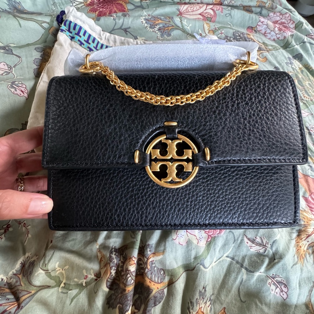 Tori Burch black and gold shoulder bag